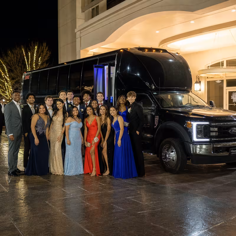 Party bus interior with wraparound leather seating and LED lighting in Trenton