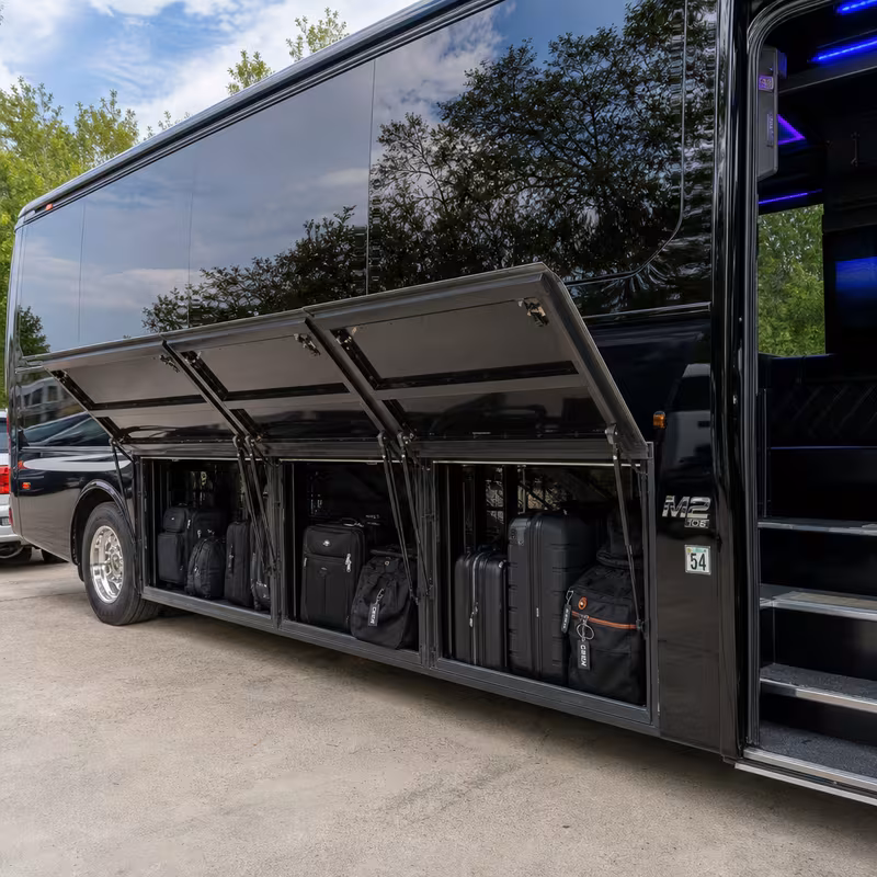 Party bus interior with wraparound leather seating and LED lighting in Trenton