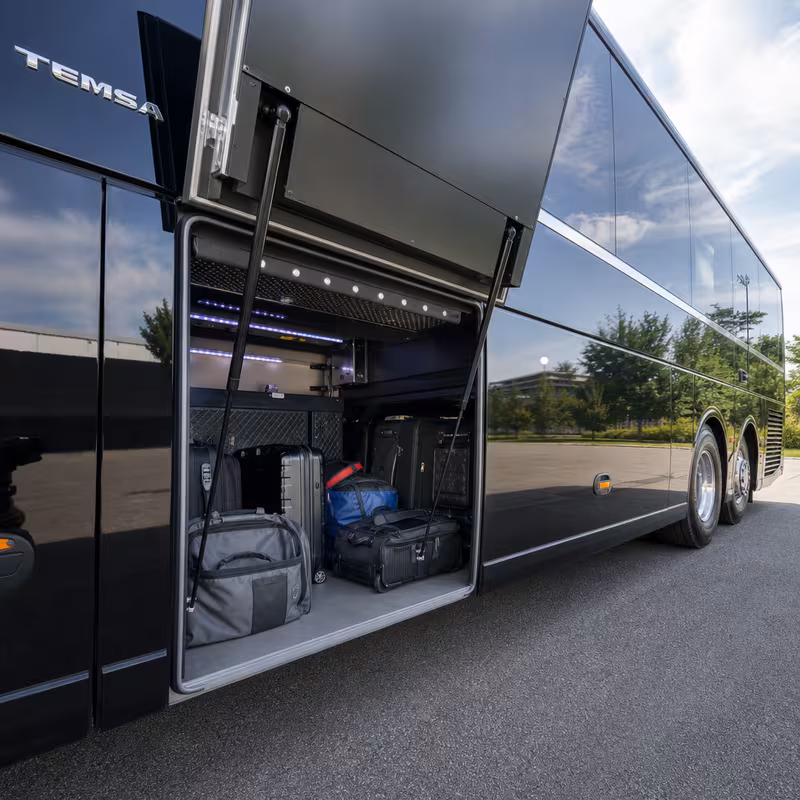 Party bus interior with wraparound leather seating and LED lighting in Trenton